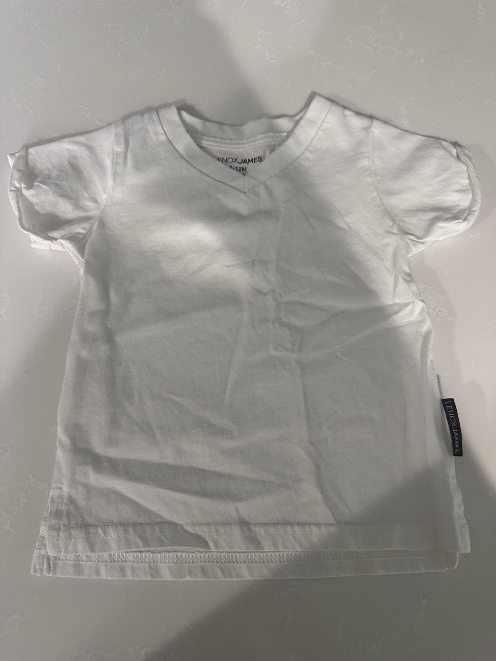 Kids White V-Neck Tee by EnoX James